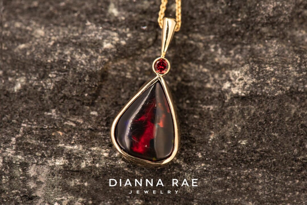 14k Yellow Gold Red Ethiopian Opal Pendant with Ruby Accent