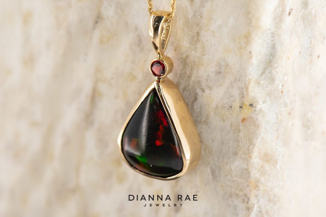 14k Yellow Gold Red Ethiopian Opal Pendant with Ruby Accent - Image 2