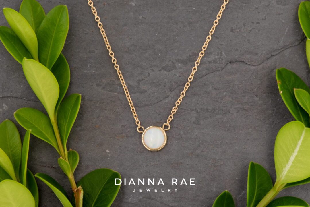 14k yellow gold white opal pendant