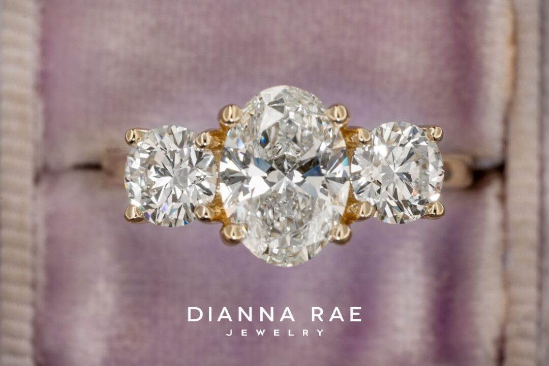 Oval Diamond Ring with Round Diamond accents on 14K Yellow Gold - Image 2