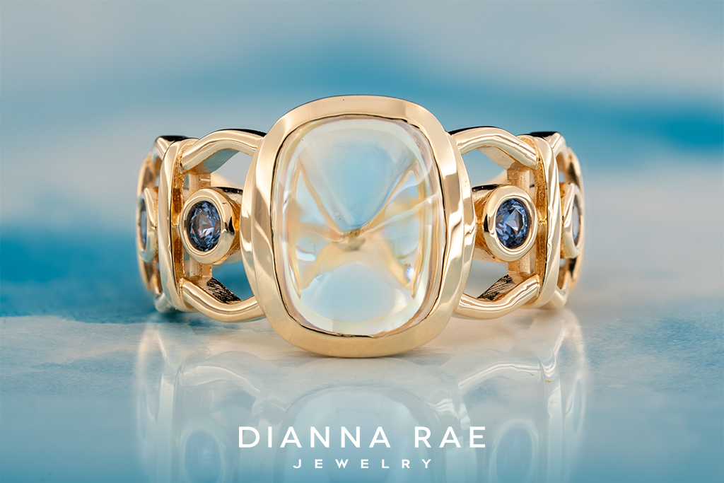 Sugarloaf Rainbow Moonstone Ring with Yogo Sapphire Accents